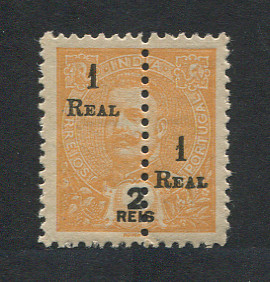 1911 - Afinsa nº 230. D. Carlos I com sobretaxa e perfurado a meio. Selo de 1r/2r novo COM CHARNEIRA (*) e goma original. Em boas condições.