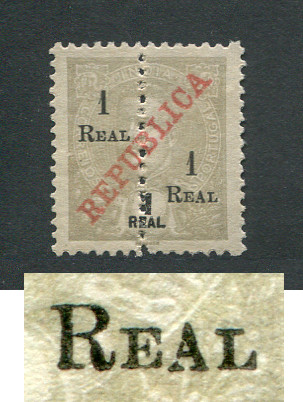 1911 - Afinsa nº 238c. D. Carlos I com sobrecarga REPUBLICA e sobretaxa. Perfurado a meio. Selo de 1r/1r novo sem goma. ''A'' DE ''REAL'' MAIOR. Em boas condições.