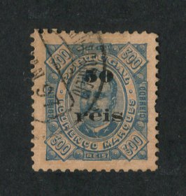 1896 - Afinsa nº 31. D. Carlos com sobretaxa. Selo de 50r/300r usado. Tem o denteado irregular.