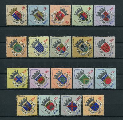 1963 - Afinsa nº 436/454. Escudos de Armas de Angola 1ª emissão. Série completa nova SEM CHARNEIRA (**) e com goma original. Em boas condições.