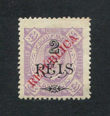 1914 - Afinsa nº 286. D. Carlos I com sobretaxa e sobrecarga local REPUBLICA. Selo de 2r/8T novo sem goma como emitido. Em boas condições.