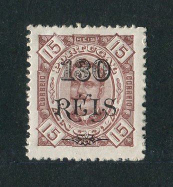 1902 - Afinsa nº 69. D. Carlos I com sobretaxa. Selo de 130r/75r novo, COM CHARNEIRA (*) e goma original. Denteado 12 1/2, papel porcelana. Em boas condições.
