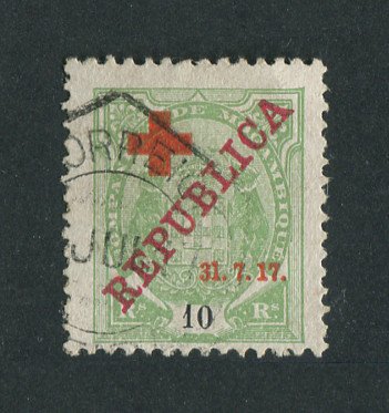 1917 - Afinsa nº 108b. Tipo Elefantes com sobrecargas REPUBLICA e CRUZ VERMELHA. Selo de 10r reis usado. VARIEDADE "1" de "31" MAIOR. Em boas condições.