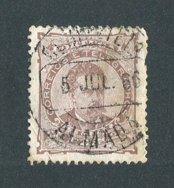 1882/83 - Afinsa nº 57b. D. Luis I de frente. Selo de 25 reis usado. Papel porcelana, denteado 13 1/2. CARIMBO DE ALMADA. Vários defeitos.