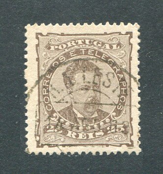 1882/83 - Afinsa nº 57e. D. Luis I de frente. Selo de 25 reis usado. Papel liso, denteado 13 1/2. CARIMBO AMBULÂNCIA POSTAL - R.A LESTE (Repartição Ambulante). Em boas condições.