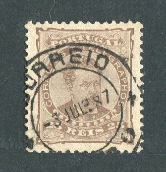1882/83 - Afinsa nº 57c. D. Luis I de frente. Selo de 25 reis usado. Papel liso, denteado 11 1/2. Pequena transparência.
