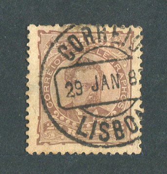 1882/83 - Afinsa nº 57c. D. Luis I de frente. Selo de 25 reis usado. Papel liso, denteado 11 1/2. Pequena transparência.