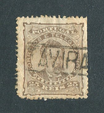 1882/83 - Afinsa nº 57e. D. Luis I de frente. Selo de 25 reis usado. Papel liso, denteado 13 1/2. CARIMBO NOMINATIVO - TAVIRA. Vários defeitos.