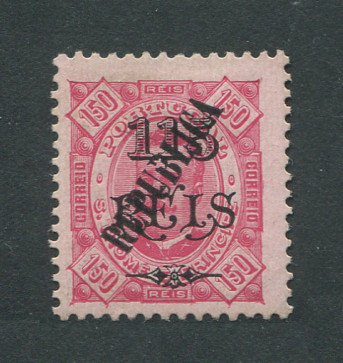 1913 - Afinsa nº 132. D. Carlos I com sobrecarga LOCAL República. Selo de 115r/150r novo sem goma como usual. Em boas condições.