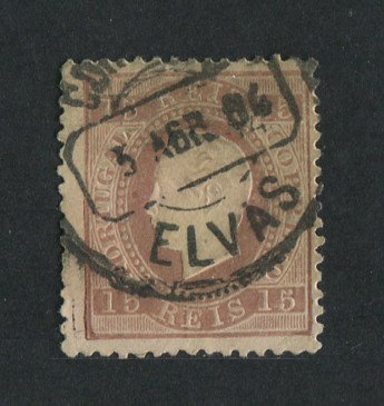 1870/6 - Afinsa nº 38. D. Luis I, fita direita.Selo de 15 reis usado. Papel liso, denteado 12 1/2. Carimbo de Elvas. Pequeno vinco.