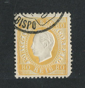 1870/6 - Afinsa nº 42i. D. Luís I, fita direita.Selo de 80 reis usado. Papel porcelana, denteado 12 1/2. Carimbo de Vila do Bispo. Canto curto e pequena transparência.