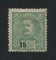 1898 - Afinsa nº 140. D. Carlos I, novas cores e valores. Selo de 15 reis novo com charneira (*) e goma original. TAXA DESLOCADA. Denteado irregular.