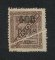 1902 - Afinsa nº 74a. D. Carlos I com sobretaxa. Selo de 400r/2 1/2r novo sem goma. Denteado 12 1/2. Dobrado durante a impressão “PLIÉ”. Em boas condições.