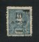1905 - Afinsa nº 111. D. Carlos I com sobretaxa. Selo de 10a/12a usado. Em boas condições.