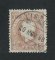 1870/6 - Afinsa nº 38E. D. Luis I, fita direita.Selo de 15 reis usado. Papel porcelana, denteado 12 1/2. Denteado irregular.