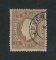 1870/6 - Afinsa nº 38C. D. Luis I, fita direita.Selo de 15 reis usado. Papel liso, denteado 13 1/2. Carimbo de Funchal. Denteado irregular e pequeno vinco.