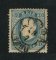 1879/80 - Afinsa nº 50. D. Luis I fita direita, novas cores. Selo de 50 reis usado. AZUL CLARO. Papel liso, denteado 12 1/2. Pequena transparência.